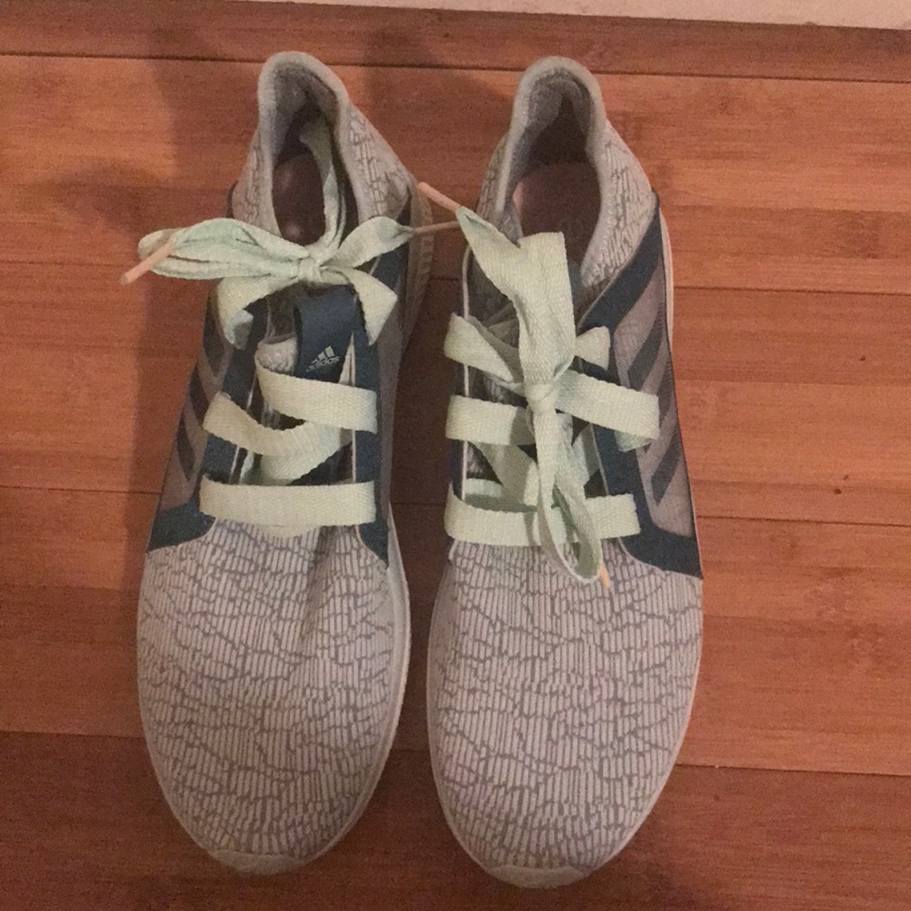Blue adidas running shoes
